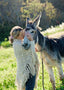 Guylaine kissing a donkey from her farm